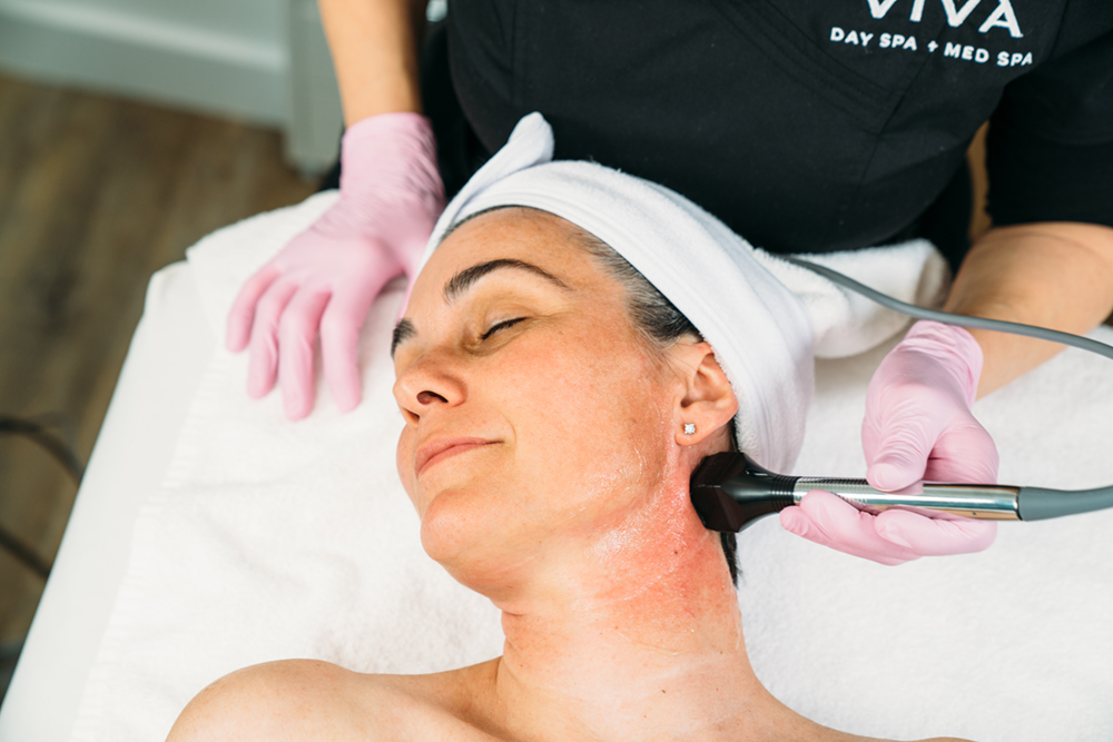 Close-up of a woman receiving the Forma facial skin tightening treatment at Viva Day Spa + Med Spa in Austin, TX